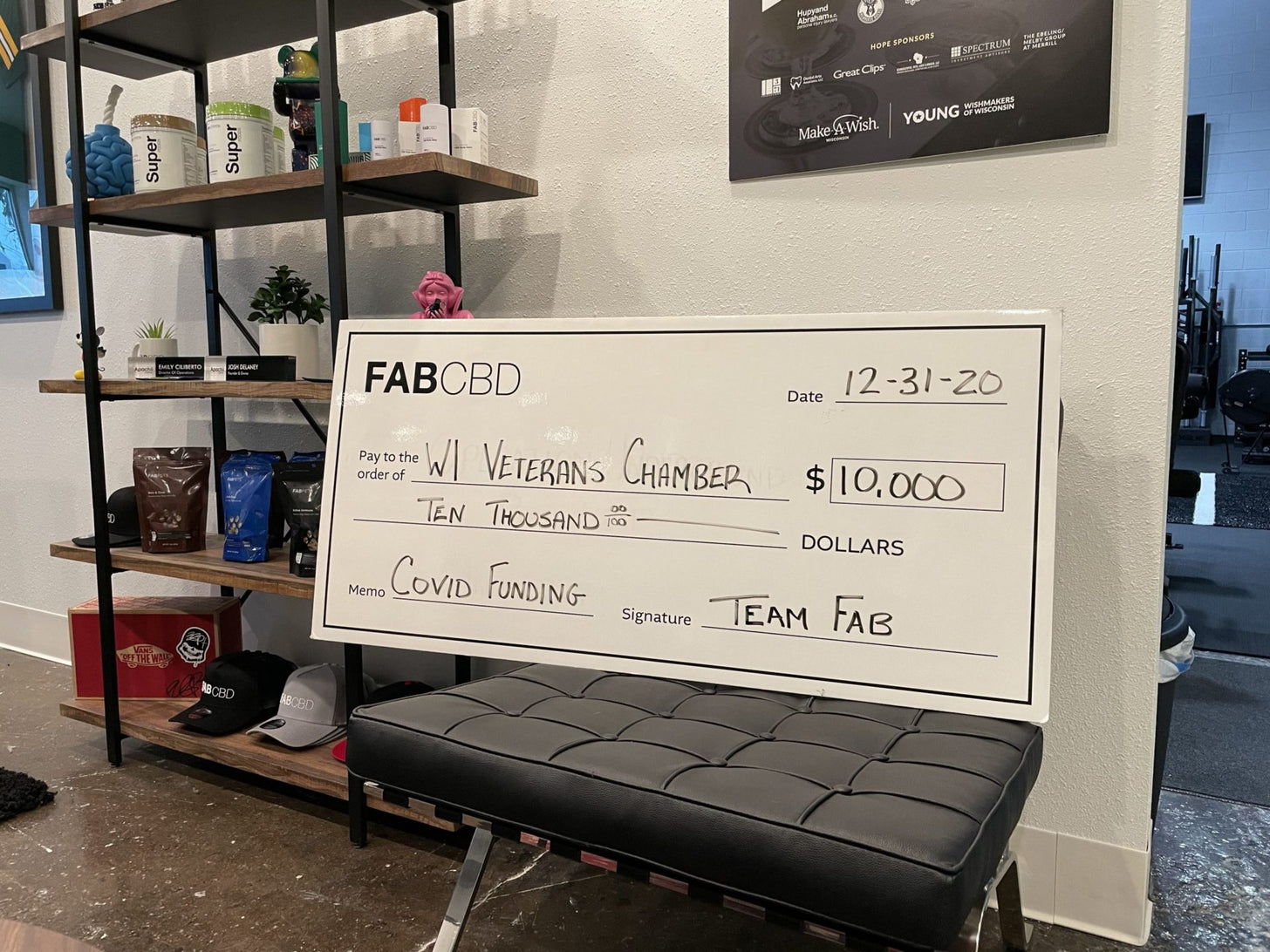 A check for $10,000 from FAB CBD to Wisconsin Veteran's Chamber