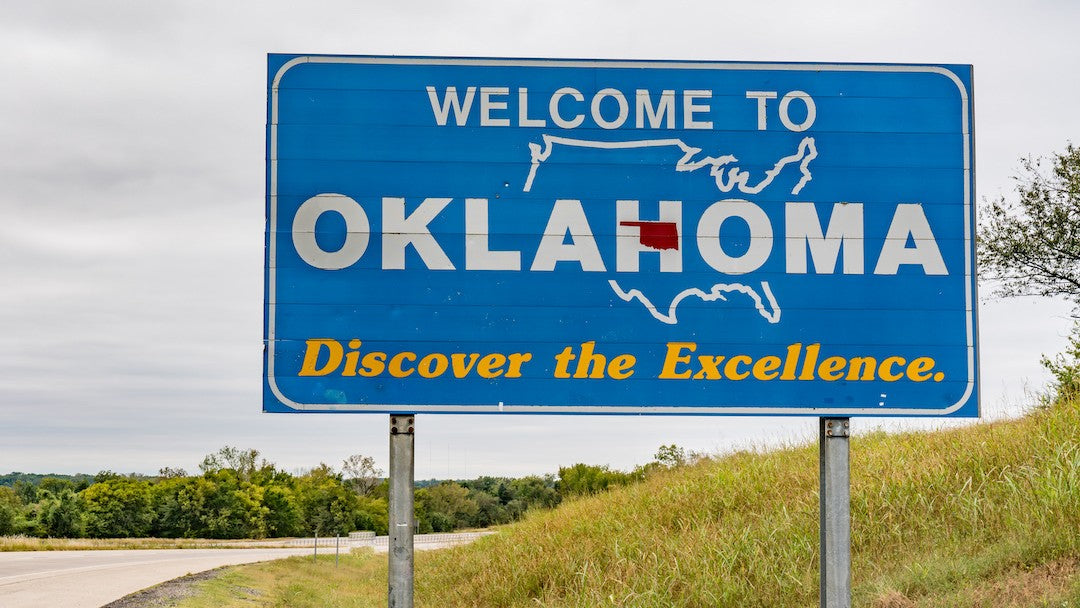 Welcome To Oklahoma road sign on the highway