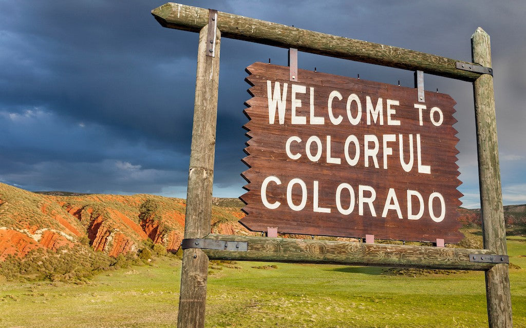 A Colorado State welcome sign that says "Welcome to Colorful Colorado"