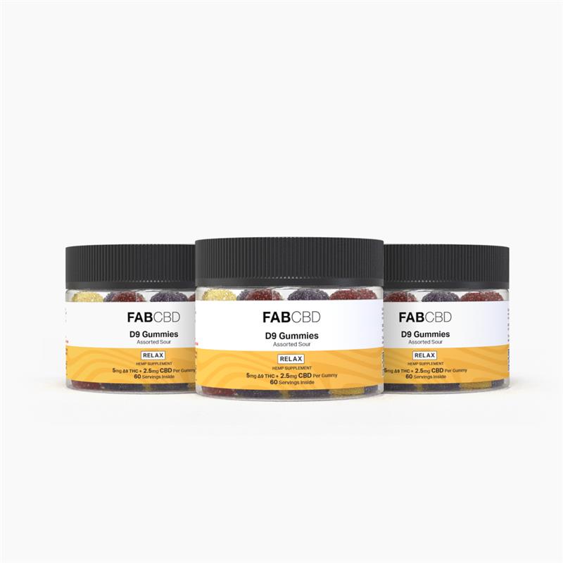 Front-facing trio of clear jars showing colorful sugar-coated gummies, labeled "FABCBD Delta 9 Gummies" with black lids on a white background.