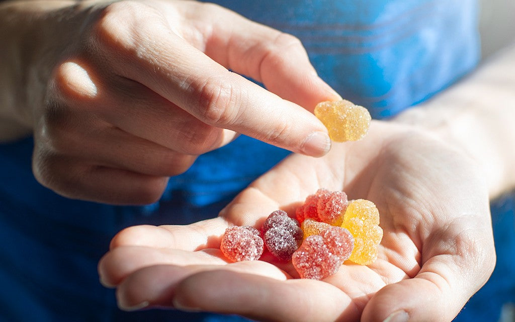cbd gummies in a persons hand