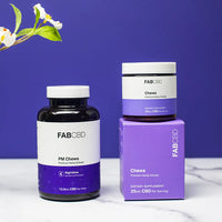 Two FAB CBD gummy containers, one labeled PM Chews in dark amber jar with white lid, the other stacked purple jar and box.
