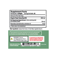 Close-up of the CBD Softgels supplement facts and warning labels on a green-backed product sticker, shown straight-on with clear black text and a barcode.