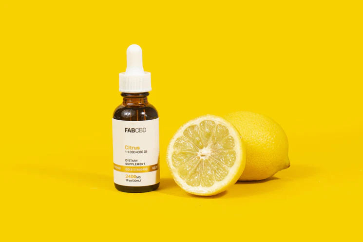 fab cbd full spectrum cbg oil with sliced lemon