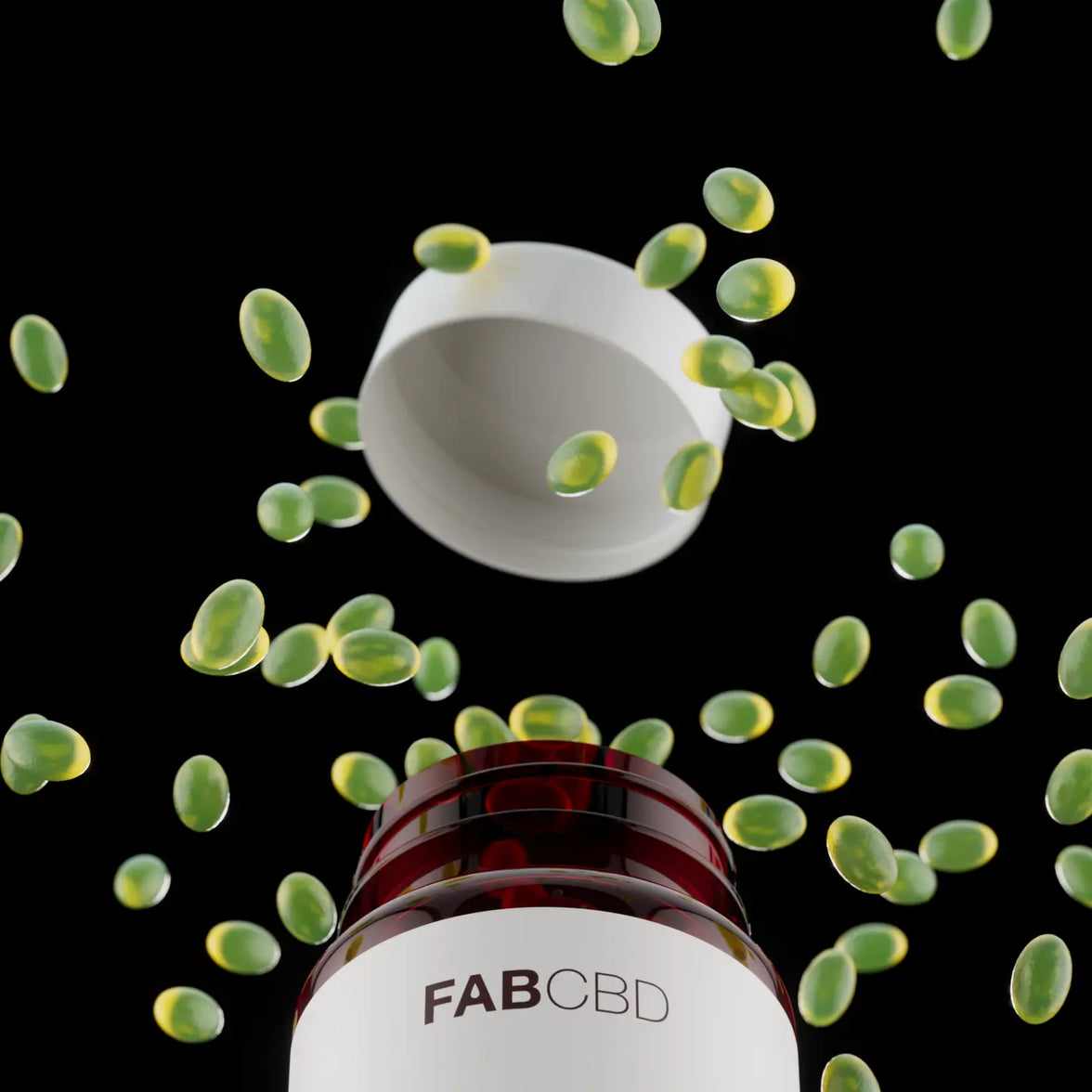 A close-up, dramatic view from below a FAB CBD Complete Cannabinoid™ 1:1:1:1 Softgels amber glass bottle, showing numerous translucent, dark green oval softgels floating and scattering in mid-air against a black background. The white cap of the bottle floats suspended above the opening, and the front of the bottle clearly displays the bold FAB CBD brand name.
