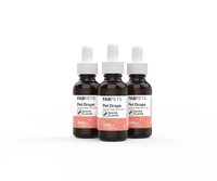 Three brown glass dropper bottles labeled FAB PETS Pet Drops with orange accents and white droppers.