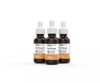 Three amber glass bottles of FABPets CBD Pet Drops with white droppers and orange labels on a white background.