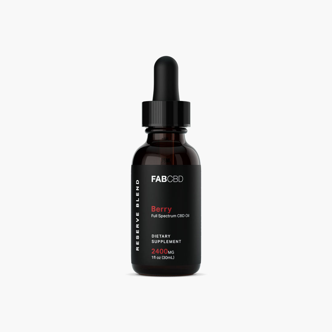 Centered studio shot of the FABCBD CBD Oil amber dropper bottle with a black label reading "Berry" against a white background.