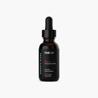 Centered studio shot of the FABCBD CBD Oil amber dropper bottle with a black label reading "Berry" against a white background.