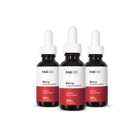 Front-facing trio of FABCBD CBD Oil berry bottles with white droppers and red-and-white labels on a white background.