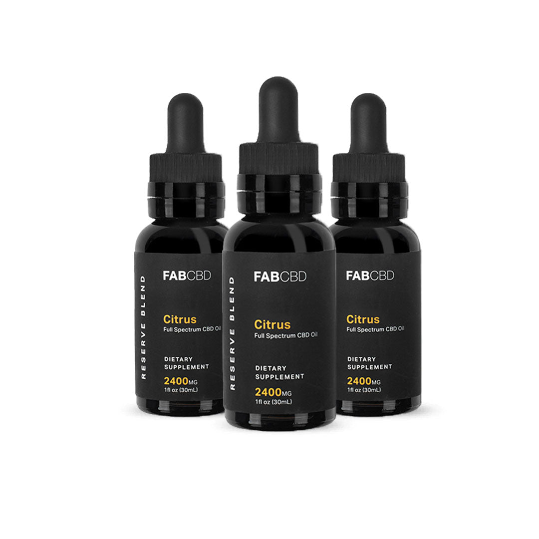 Front-facing trio of FABCBD CBD Oil dropper bottles with black labels reading "Citrus" against a white background.