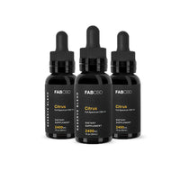 Front-facing trio of FABCBD CBD Oil dropper bottles with black labels reading "Citrus" against a white background.