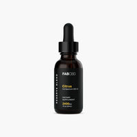 Front-facing shot of the FABCBD CBD Oil amber dropper bottle with a black label reading "Citrus" against a white background.