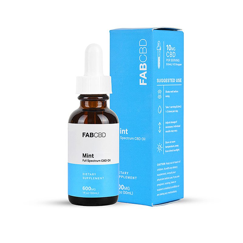 Front view of the FABCBD CBD Oil Mint 600mg amber dropper bottle next to its bright blue boxed packaging.