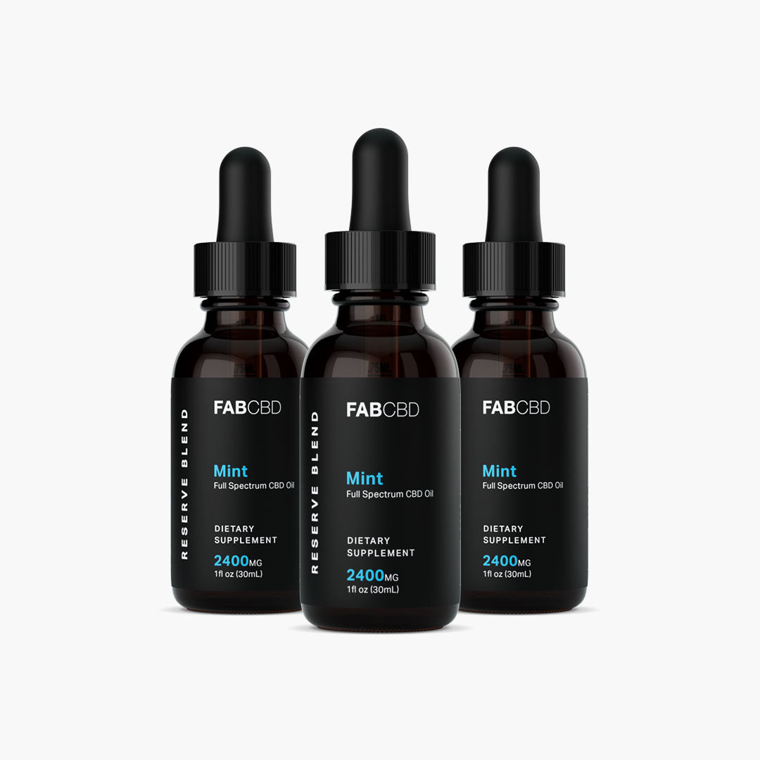 Front-facing trio of FABCBD CBD Oil mint bottles with black droppers and minimalist labels on a white background.