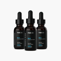 Front-facing trio of FABCBD CBD Oil mint bottles with black droppers and minimalist labels on a white background.