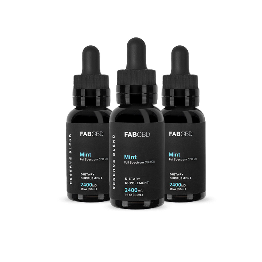 Front-facing trio of FABCBD CBD Oil mint bottles with black droppers and minimalist labels against a white background.