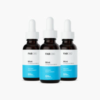Front-facing trio of CBD Oil bottles labeled "FABCBD CBD Oil" with white droppers and blue Mint labels on a white background.