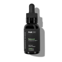 Front-facing bottle shot of FAB CBD CBD Oil with a black label and dropper casting a soft shadow on a white background.