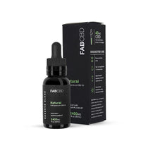 Front view of the FABCBD CBD Oil bottle with dropper beside its black, green-accented box on a white background.