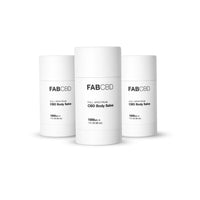 Three white cylindrical containers in a row photographed front-on, showing the FAB CBD CBD Body Salve labels against a bright white background.