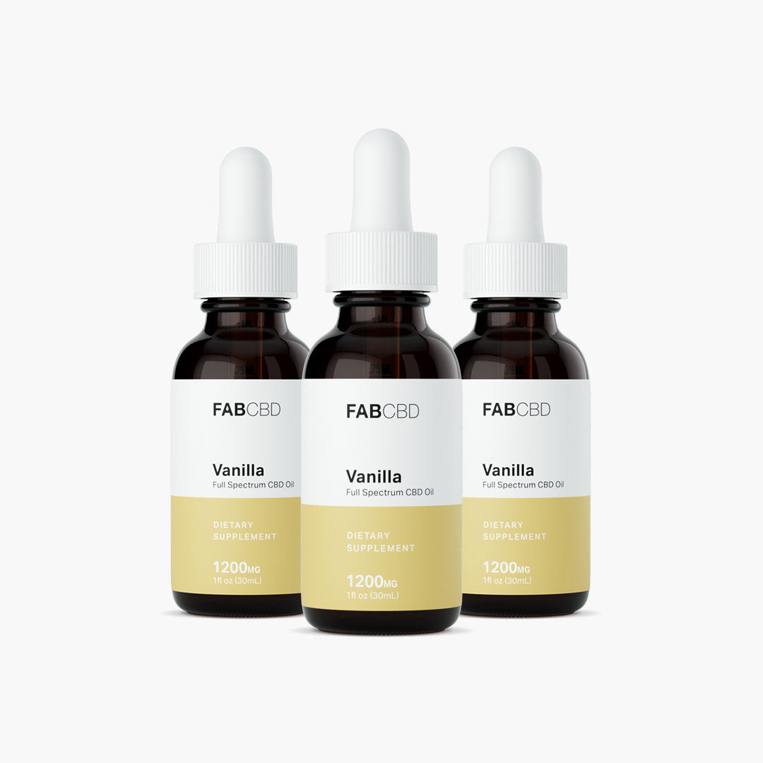 Front-facing trio of FAB CBD CBD Oil vanilla bottles with white droppers and pale yellow labels on a white background.