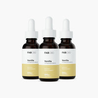 Front-facing trio of FABCBD CBD Oil vanilla bottles with white droppers and pale yellow labels on a white background